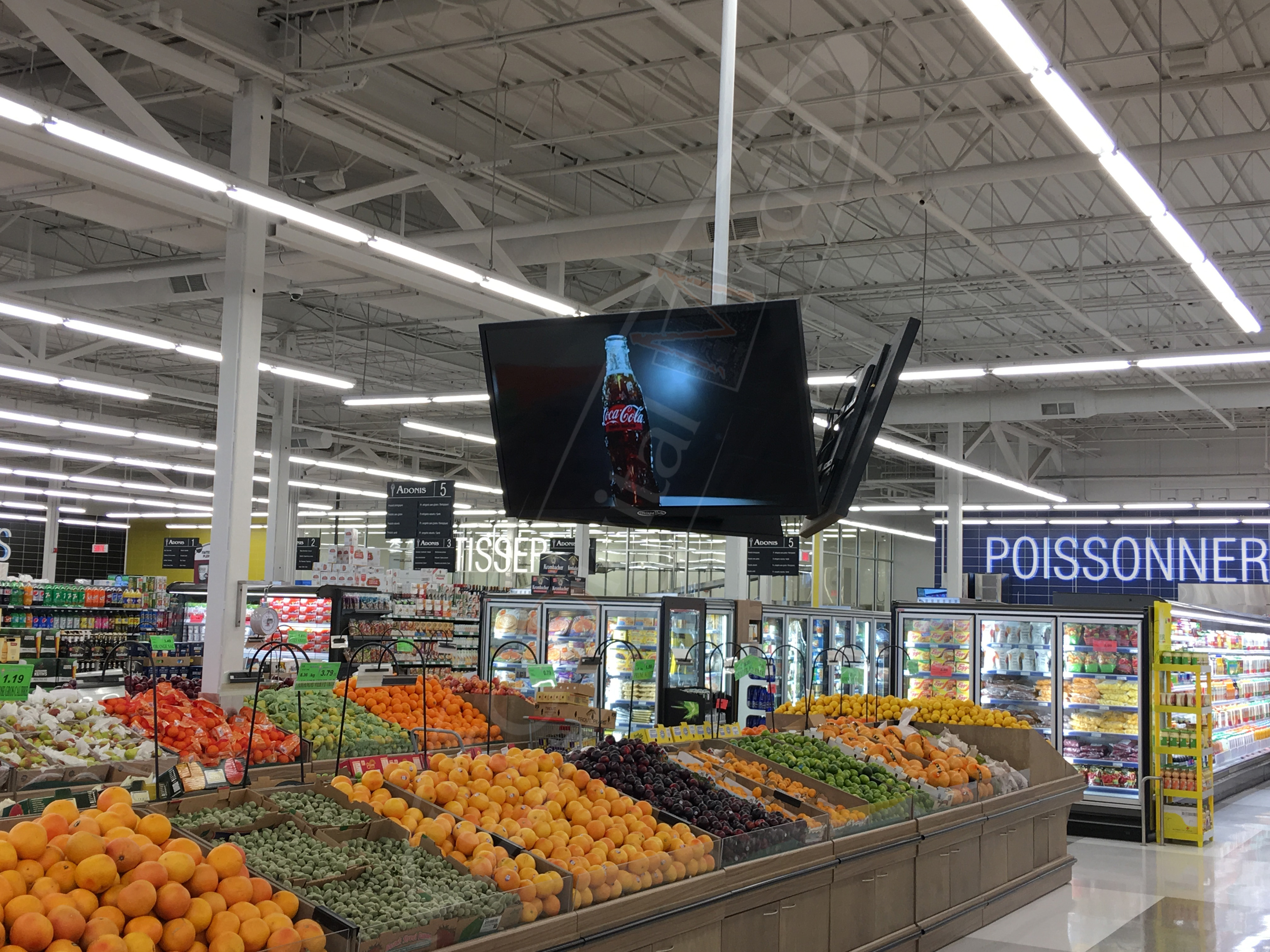 A UTG Wall Mounted LCD Screen at Marche Adonis