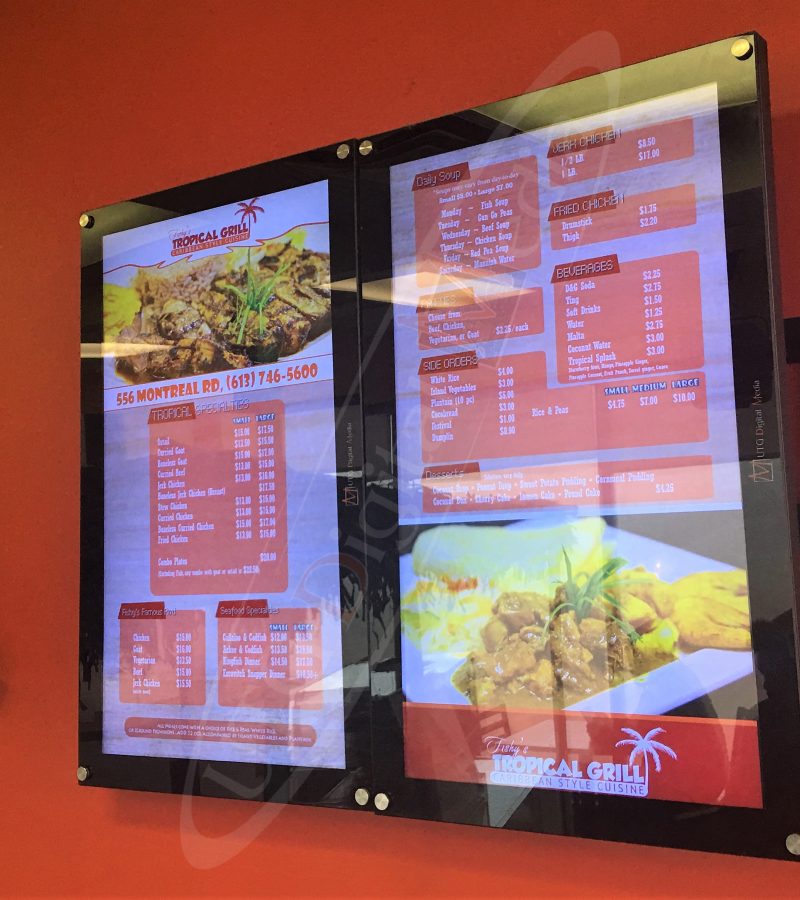 A UTG Wall Mounted LCD Screen at Fishy's Tropical Grill