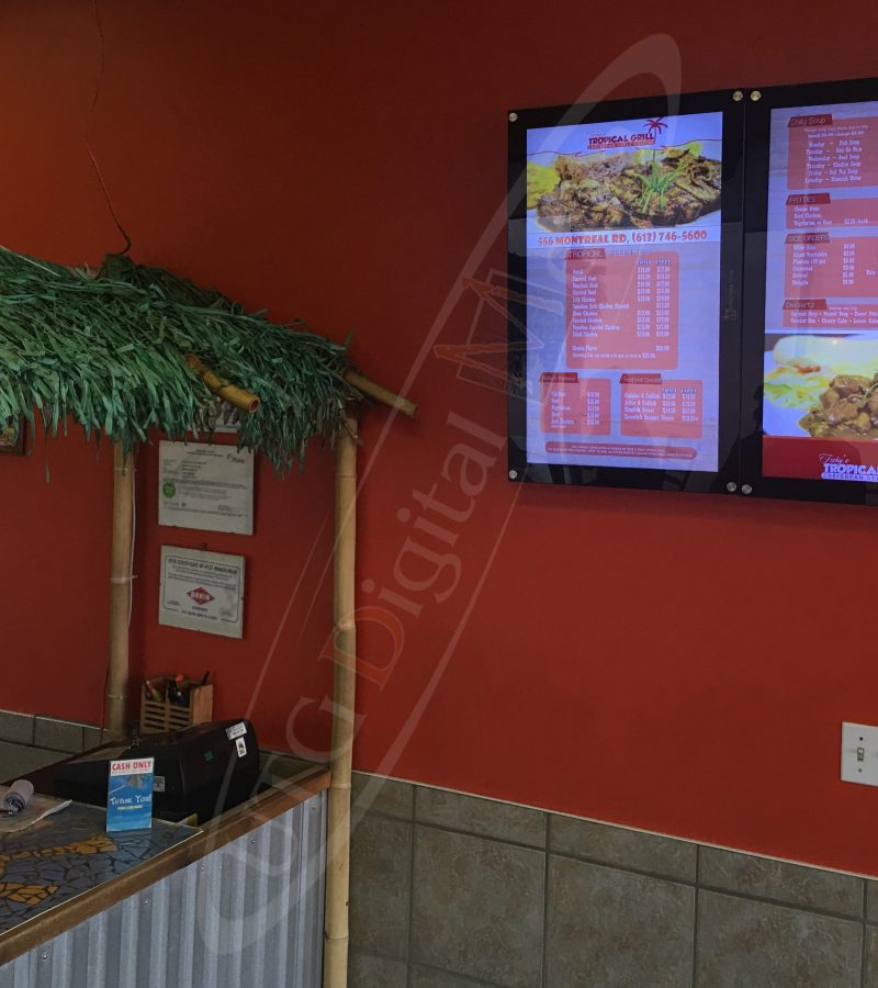 A UTG Wall Mounted LCD Screen at Fishy's Tropical Grill