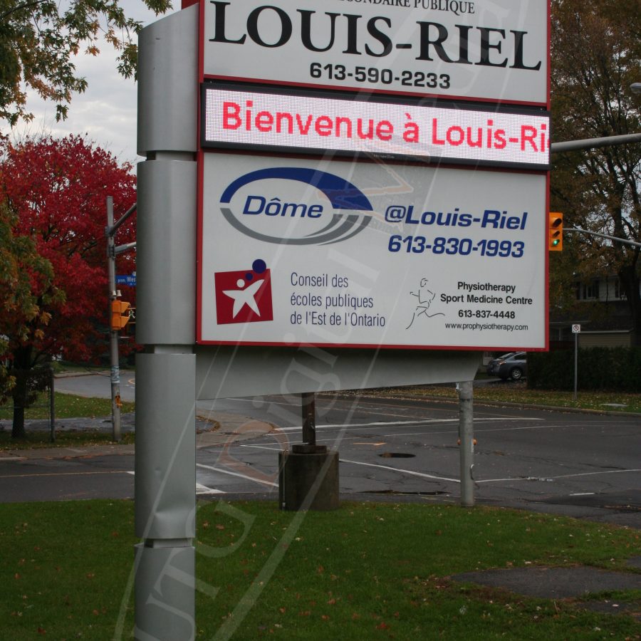 A UTG Outdoor LED Pylon sign at Louis Riel