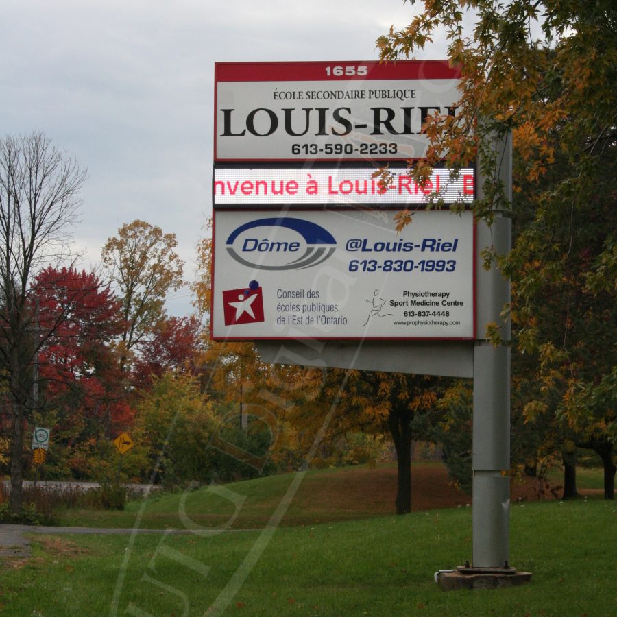 A UTG Outdoor LED Pylon sign at Louis Riel