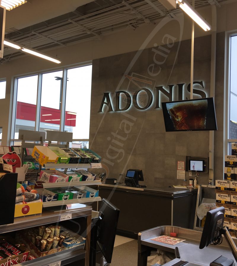 A UTG Wall Mounted LCD Screen at Marche Adonis